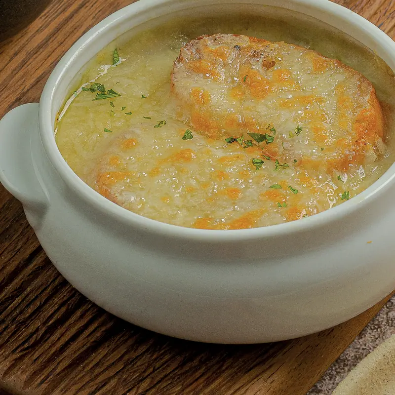 French onion soup au gratin with manchego cheese