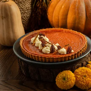 Pay de calabaza familiar entero con nuez pecana y glaseado de queso crema